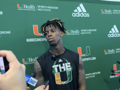 Miami’s starting quarterback N’Kosi Perry speaks to the media Wednesday in the Carol Soffer Indoor Practice Facility after practice. (Gabriel Urruita/SFMN)